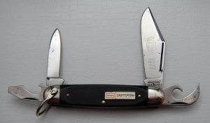 Camillus Unofficial Scout With Black Saw Cut Synthetic Covers 3 5/8
