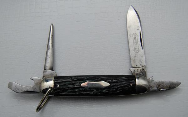 Landers, Frary and Clark Unofficial Scout With Brown Jigged Synthetic Covers 3 1/2