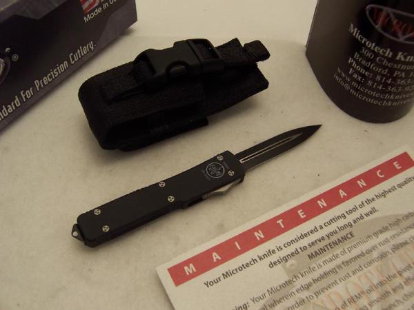 Microtech UTX-70 - Dual Action Auto Knife - Black Non-Serrated Double Edge Blade Microtech UTX-70 - Dual Action Auto Knife - Black Non-Serrated Double Edge Blade