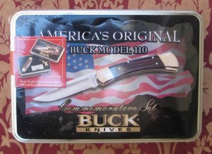 Buck 110 Folding Hunter in Walmart Gift Tin from 2005 still in shrink wrap