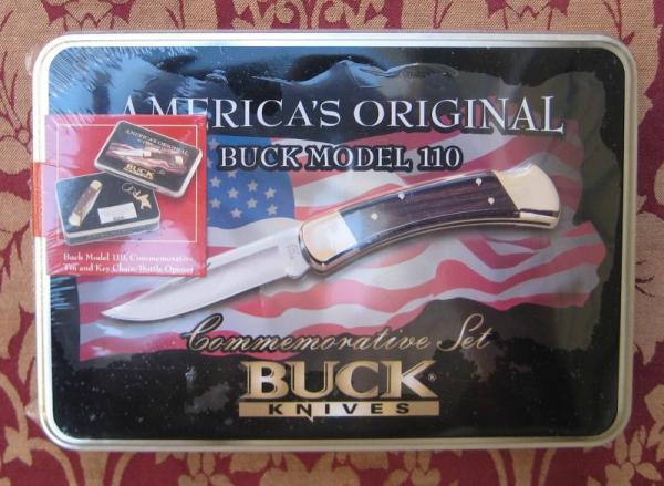 Buck 110 Folding Hunter in Walmart Gift Tin from 2005 still in shrink wrap