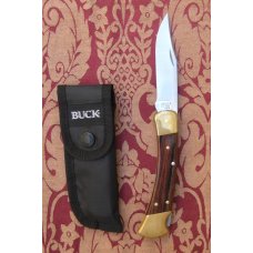 Buck 110 Folding Hunter in Walmart Gift Tin from 2005 still in shrink wrap