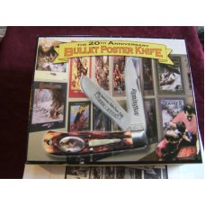 REMINGTON BULLET POSTER KNIFE 20TH ANNIVERSARY 2002 TRAPPER REMINGTON BULLET POSTER KNIFE 20TH ANNIVERSARY 2002 TRAPPER