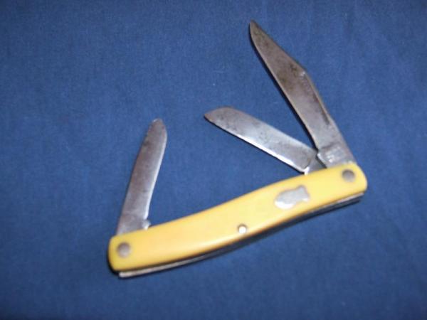  SCHRADE  WALDEN   #882Y   YELLOW HANDLE BIRDS EYE STOCKMAN