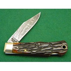 Remington UMC USA 1999 Genuine Bone R1303 Damascus Silver Bullet Lockback Knife - NIB Remington UMC USA 1999 Genuine Bone R1303 Damascus Silver Bullet Lockback Knife - NIB