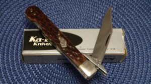 Ka-Bar Olean, NY Bone Dog Head Swing Guard Lockback Knife - NIB