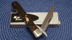 Ka-Bar Olean, NY Bone Dog Head Model 211 Swing Guard Lockback Knife (Gold Shield) - NIB
