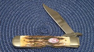 Case XX USA 2007 Stag 5111 1/2 L SS Red Shield Cheetah Swing Guard Lockback Knife