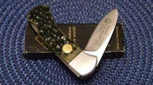 Puma Germany Stainless P220700GB Green Bone 4 Star Mini Folding Lockback Knife c.2002 - NIB