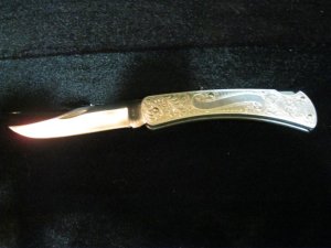Buck 111 3 dot Engraved Aluminun knife. 