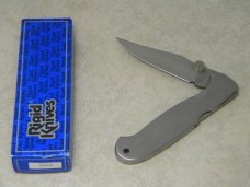 Rigid RG-22 Surgical Steel Japan Plain Edge Metal Large Lockback Thumb Stud Knife in Box