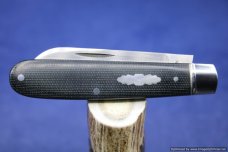 Todd Davison  Black Canvas Micarta Folder.  #1588