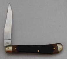 Schrade with Brown Sawcut Synthetic Covers In Very Good Condition (825)