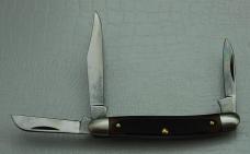 Schrade with Brown Sawcut Synthetic Covers In Excellent Condition (876)