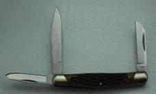 Buck with Brown Jigged Synthetic Covers In Excellent Condition (898)