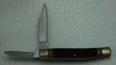 Schrade with Brown Jigged Synthetic Covers In Excellent Condition (899)