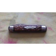 Kutmaster Equal End 2 blade jack. Jigged Bone Handles with shield