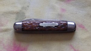 Kutmaster Equal End 2 blade jack. Jigged Bone Handles with shield