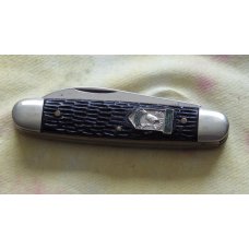 1950 Ulster Equal End 3 blade cattle knife. Jigged black handles with 1950 safety award shield
