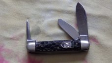 1950 Ulster Equal End 3 blade cattle knife.  Jigged black handles with 1950 safety award shield