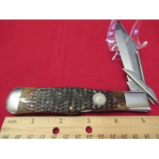 Case XX 1983 Large Brown Bone Lockback Swing Guard Coke Bottle Pattern # 061050L
