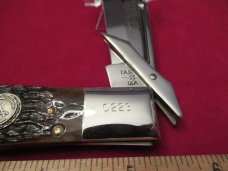  Case XX 1983 Large Brown Bone Lockback Swing Guard Coke Bottle Pattern # 061050L