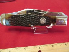  Case XX 1983 Large Brown Bone Lockback Swing Guard Coke Bottle Pattern # 061050L