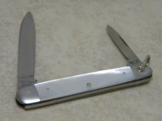E Bruckmann Solingen Germany Pearl Sleeveboard Pen Knife with Bale - C. 1891-1956