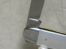 E Bruckmann Solingen Germany Pearl Sleeveboard Pen Knife with Bale - C. 1891-1956