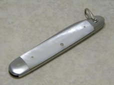 E Bruckmann Solingen Germany Pearl Sleeveboard Pen Knife with Bale - C. 1891-1956