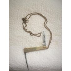 MINATURE ON A GOLD CHAIN KNIFE