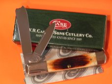 Case xx 2006 Razor Pocket Knife w Beautiful Carmel (Redish Brown) Handles -Unusual Case Shield