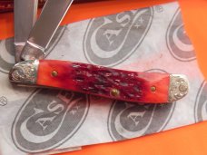Case xx 1987 TrapperNut Trapper Nut Peanut Knife w Red Bone Handles & Fancy Scroll Bolsters -NOS