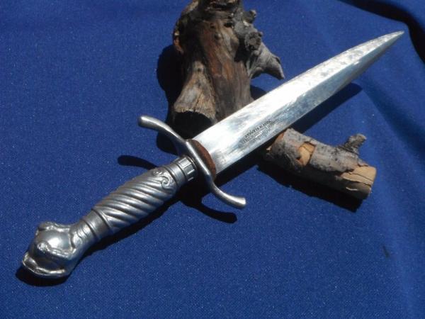 VINTAGE BALL & TALON HANDLED KORIUM DAGGER. MADE IN SOLINGEN, GERMANY W/ LEATHER SHEATH VINTAGE BALL & TALON HANDLED KORIUM DAGGER. MADE IN SOLINGEN, GERMANY W/ LEATHER SHEATH