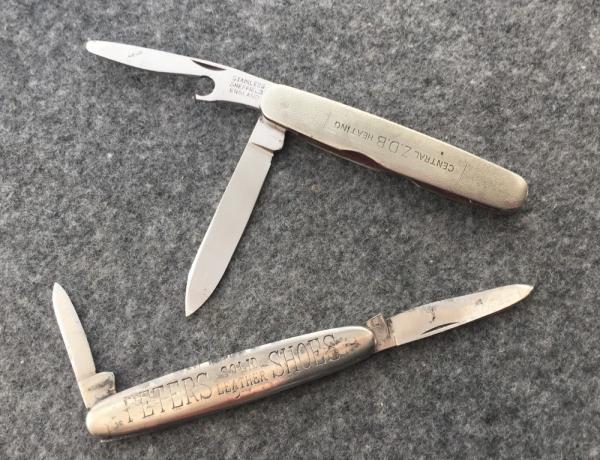 Two Metal Frame Advertising Knives. Two Metal Frame Advertising Knives.