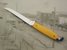 Queen Steel Trout and Bird knife #85A: 6 ¼” overall with 3” blade, Amber Delrin handles  