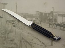 Queen Steel Trout and Bird knife #85: 6 ¼” overall with 3” blade, imitation Winterbottom Bone Delrin