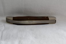 Chicago Folding Hunter P-19 USA Believed to be made by Schrade in the 1980s walnut handles. 