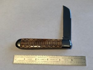 Ken Coats custom made folder scrat bone