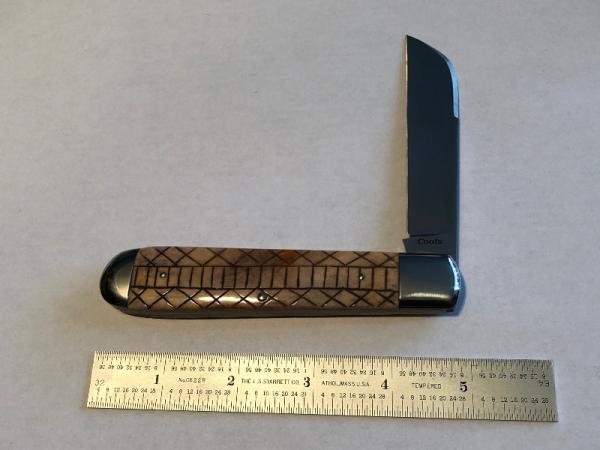 Ken Coats custom made folder scrat bone 