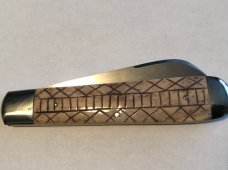 Ken Coats custom made folder scrat bone 