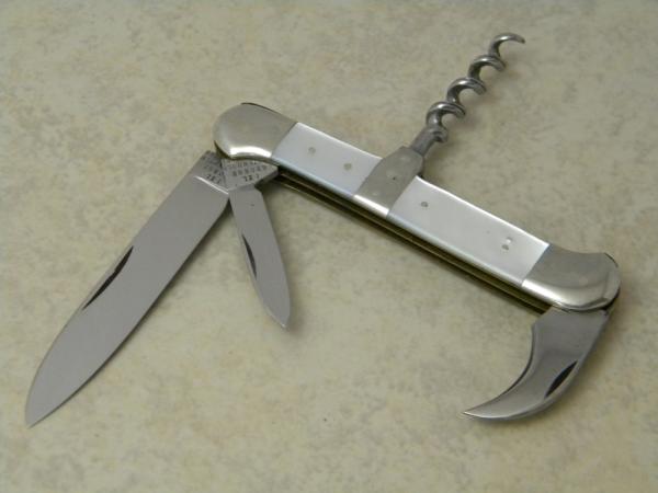 IXL George Wostenholm Sheffield England Mother of Pearl Corkscrew Champaign Knife