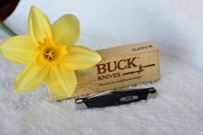 Buck Lancer 305 Cat.  481 Black saw cut delrin.  ^ (1988)
