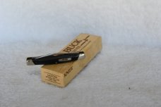 Buck Lancer 305 Cat.  481 Black saw cut delrin.  ^ (1988)