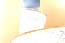 J.A. Henckels two blade folder. Brass with design on handle. Mint.