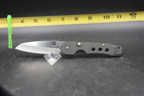 Gently Used Spyderco Smock s30v ball bearing flipper.  Only carried once or twice outside home    