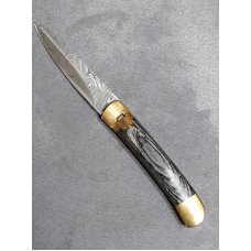 Lever lock knife.