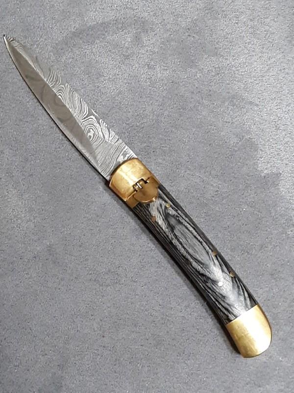 Lever lock knife. 