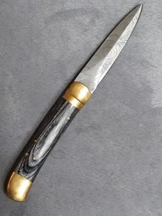 Lever lock knife. 