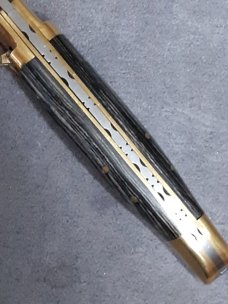 Lever lock knife. 